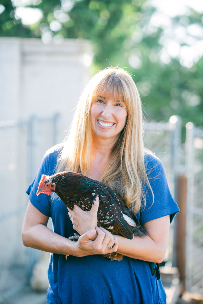 Anne Watson Holding A Chicken